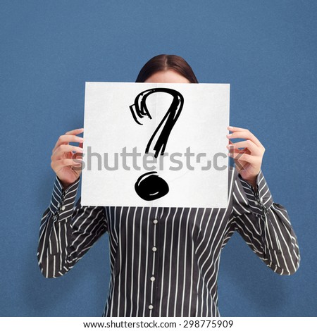 Businesswoman showing a white card in front of her face against blue background