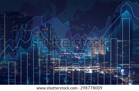 Trading graph on the cityscape at night and world map background,Business financial concept Royalty-Free Stock Photo #298778009