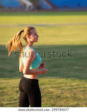 Runner - woman running training.Female fitness concept