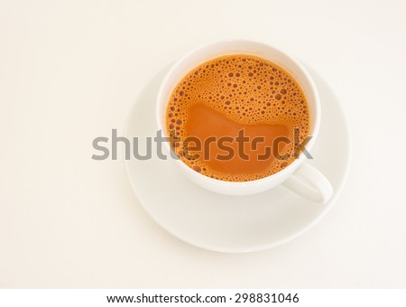 Hot milk tea in white cup on white background,  Tea with milk and bubble on white, Hot tea relax sweet drink time, Milk tea or hot tea milk Royalty-Free Stock Photo #298831046