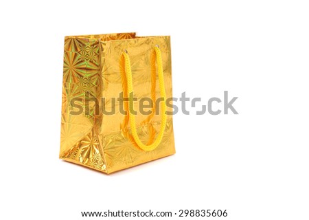 gold gift parcel isolated on white