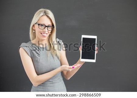 Teacher holding tablet computer