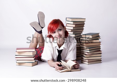 Red-haired girl, cheerful face, non-standard, piercings on his face, blue eyes, earrings tunnels, stack of books, tie and white shirt, photo in bright colors.