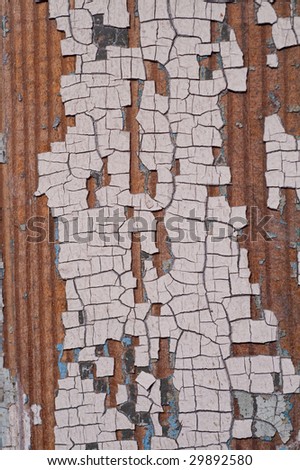 close up of cracked paint on old door
