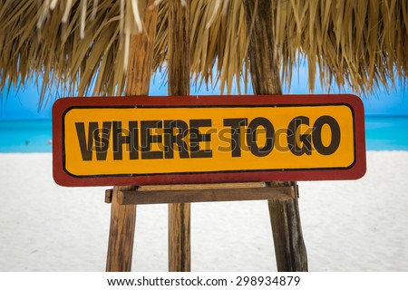 Where To Go sign with beach background