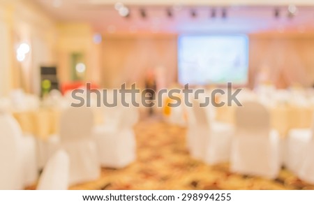 blur image of wedding party  in large hall for background usage.