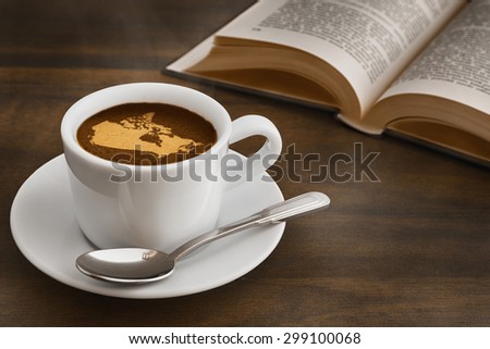 Still life photography of hot coffee beverage with map of Canada