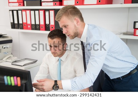 Happy Young Business Men Work In Modern Office On Computer