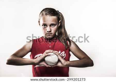 Softball girl with ball in hands retro
