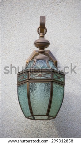 Glass lamps mounted on the wall.