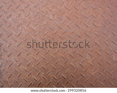 Close up of material floor with brown steel rust background.