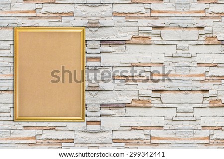 wooden picture frame on modern brick wall.free space for text.