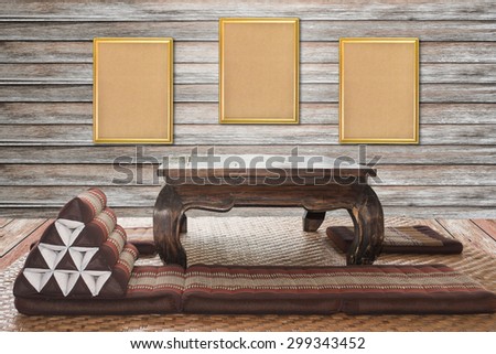 wooden frame on wood wall .  Thai traditional interior living room. local interior concept.