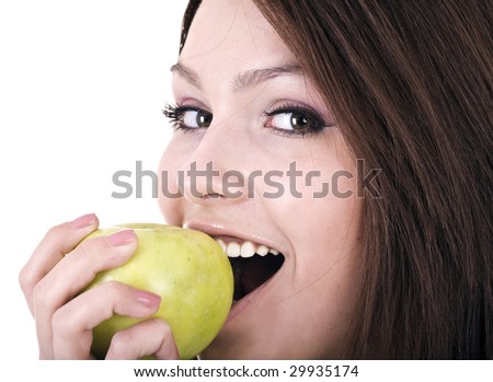 Beautiful young women with green apple. Isolated