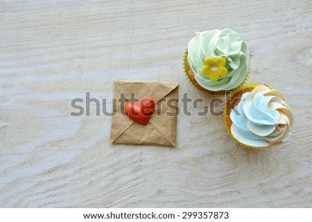 cupcakes, with cream ,decorated with hearts,Valentine's day,international women's day,love.Notepad.Valentine,love letter
