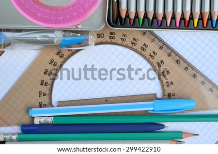 Colored pencils, pen, protractor