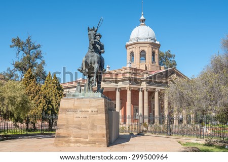 Statue of CR de Wet, an Anglo Boer War general, in front of the historical Fourth Raadzaal, seat of Free State Provincial Government Royalty-Free Stock Photo #299500964