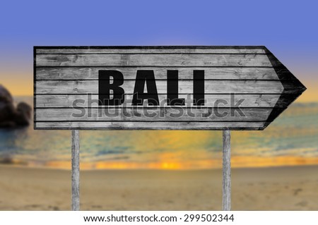 Bali wooden sign with beach background
