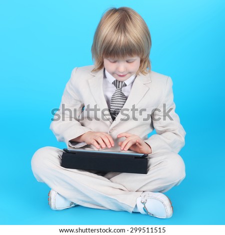 little gentleman with the tablet PC closeup