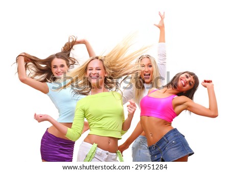 Four beautiful happy young women with a smile in bright multi-coloured clothes, isolated on a white background
