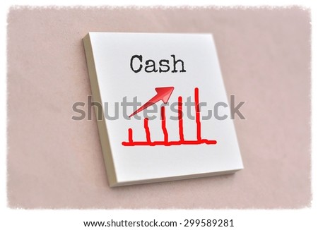 Text cash on the graph goes up on the short note texture background