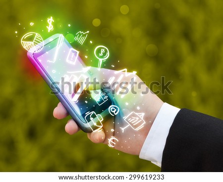Smartphone with finance and market icons and symbols concept