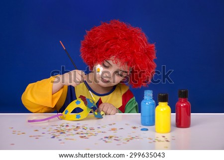 Little clown, preparations for carnival
