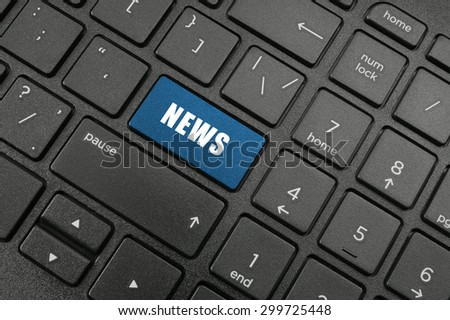 News button on black laptop keyboard