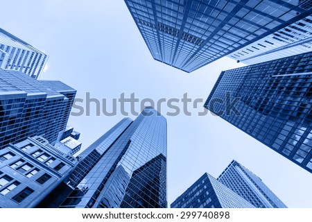 Up view in financial districtg, Manhattan, New York Royalty-Free Stock Photo #299740898