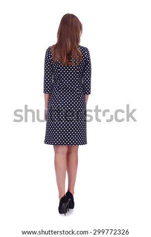 pretty young girl demonstrating polka dot dress