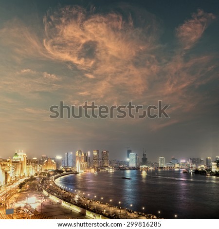 panoramic view of shanghai skyline with huangpu river at dusk