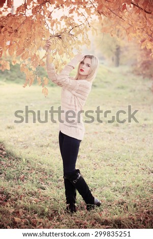 beautiful women in autumn park