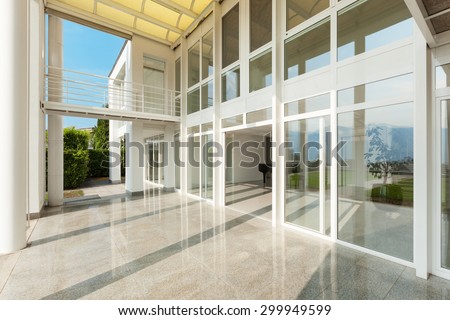 Architecture, wide veranda of a modern house, exterior Royalty-Free Stock Photo #299949599