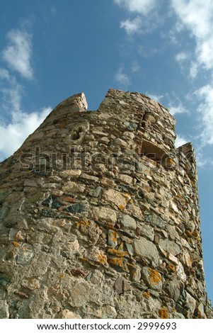 Round tower of old castle against sky