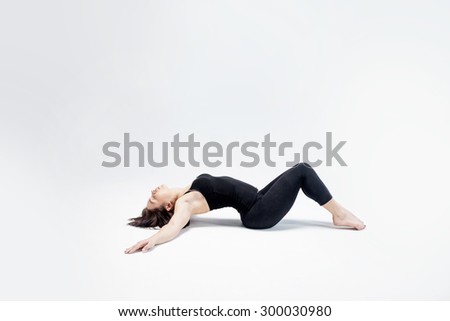 athletic girl posing in Studio, place for your text on the right