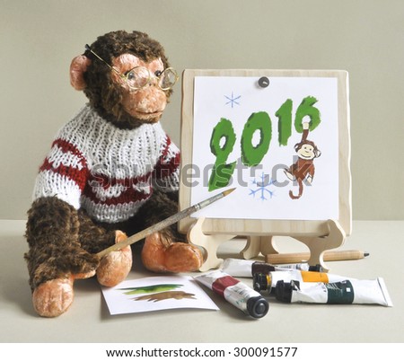 2016 - the year of the monkey.Toy monkey - painter