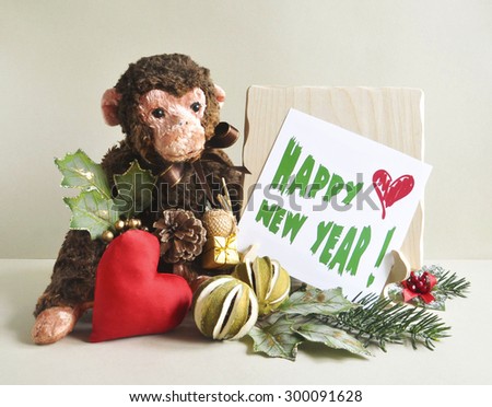 New year card 2016. Year of the Monkey. Toy monkey 