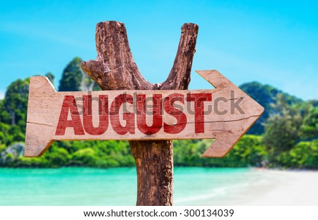 August wooden sign with beach background