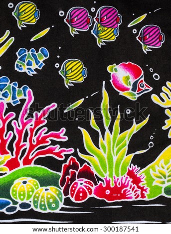 Colorful fishes fabric close up background.