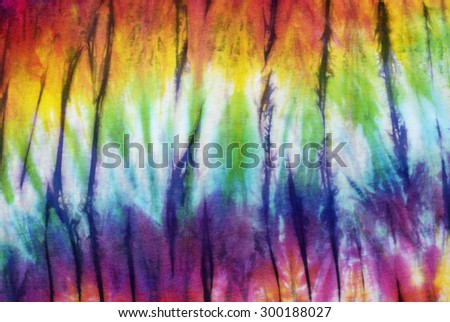 colourful tie dyed pattern on cotton fabric abstract background.
