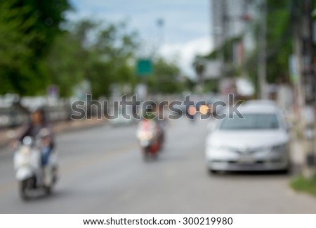 blur image of car on road in daytime