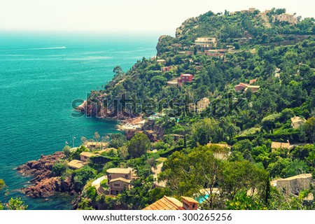 Beautiful mediterranean landscape, view of village and coastline, french riviera, France. Vintage style toned photo