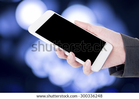 hand hold smart phone over beautiful background