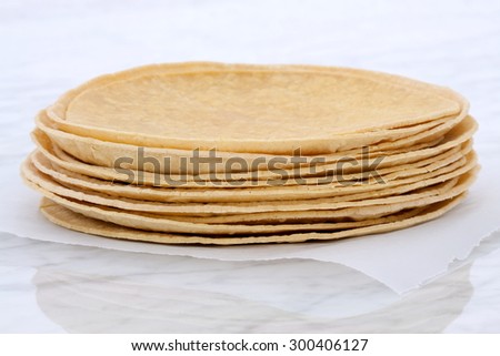 Mexican corn tortillas on retro vintage carrara marble, perfect for all your Mexican and tex-mex recipes.