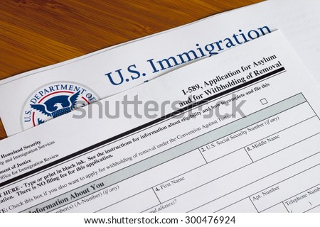 Application for asylum and for withholding of removal to fill out Royalty-Free Stock Photo #300476924