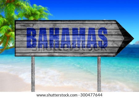 Bahamas wooden sign with beach background