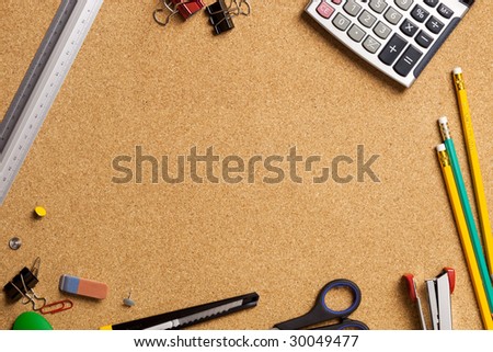 Close up view of the office tools on cork board