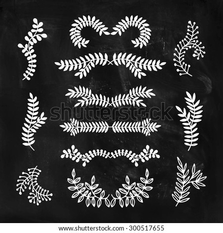 Set of  hand drawn laurels, wreath, branches. Nature, floral doodle collection on chalkboard. Decoration elements for design invitation, wedding cards, valentines day, greeting cards