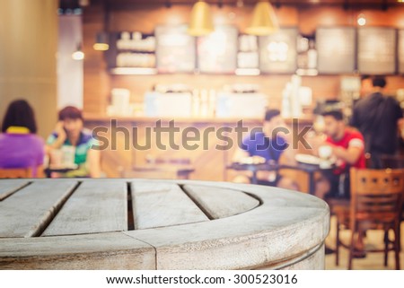 Empty top wooden table and blur with bokeh background. For product display 