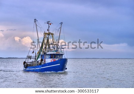North Sea fishing cutter  Royalty-Free Stock Photo #300533117